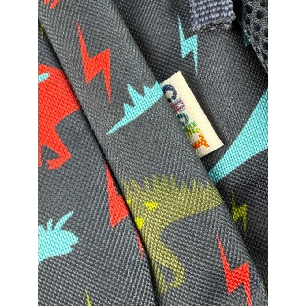 Crckt Kids Dinosaur Lightning Bolt Backpack Navy Blue Red 16.5 Inch School Bag
